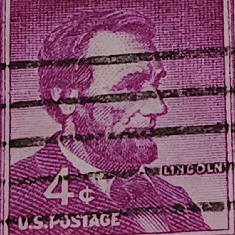 1954 4¢ Abraham Lincoln Stamp – Liberty Series – Scott #1036 – Magenta, Canceled