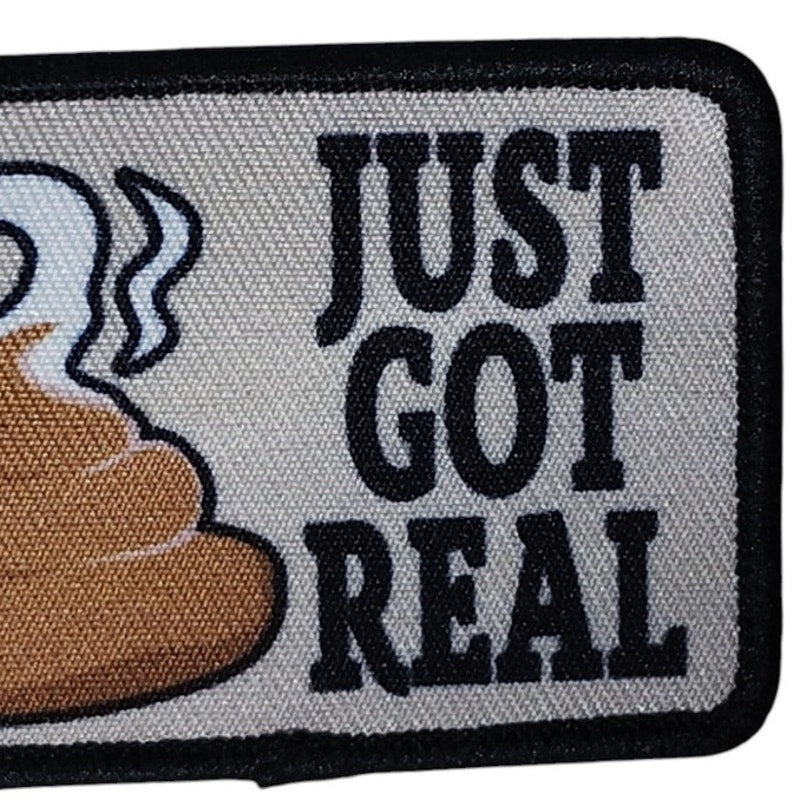 Morale Patch “Just Got Real” 3" × 2" Hook & Loop Backing – Tactical Humor – OD Border
