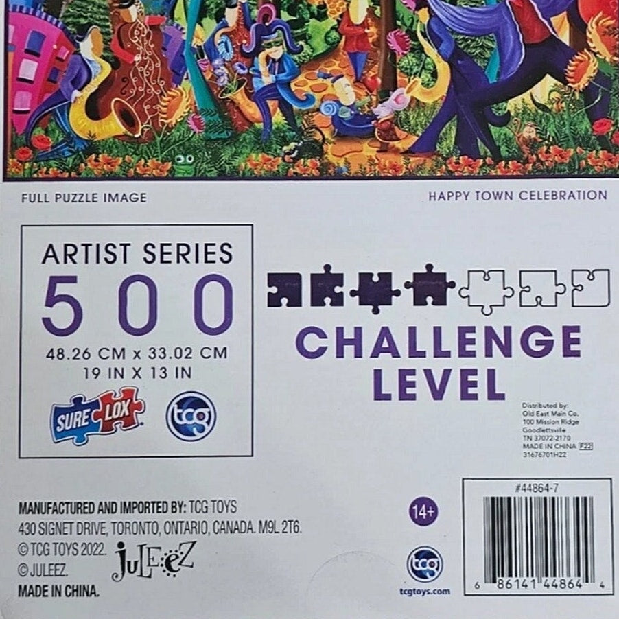 Artist Series 500‑Piece Puzzle – Happy Town Celebration, 19" x 13"