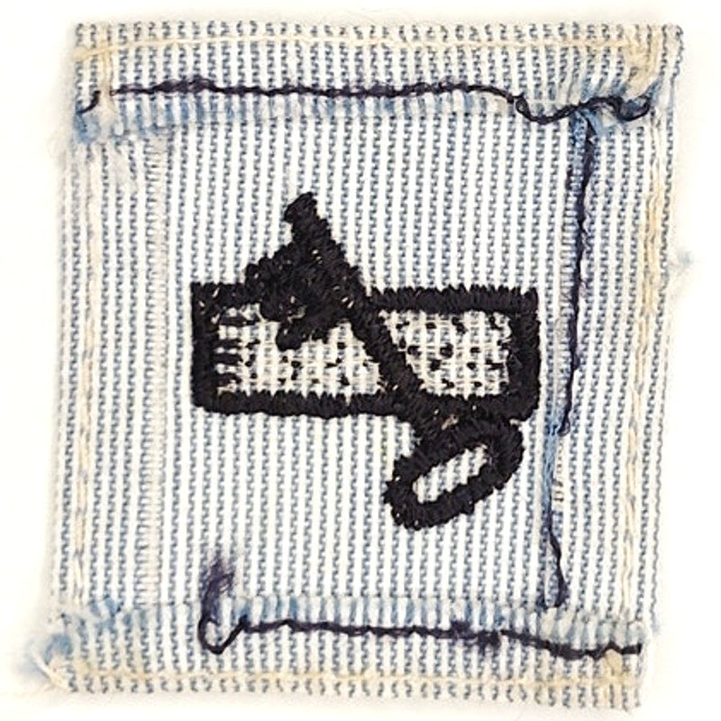 1960's US Navy Disbursing Clerk DK Striker Patch Black on Chambray 1‑3/8 × 1‑5/8