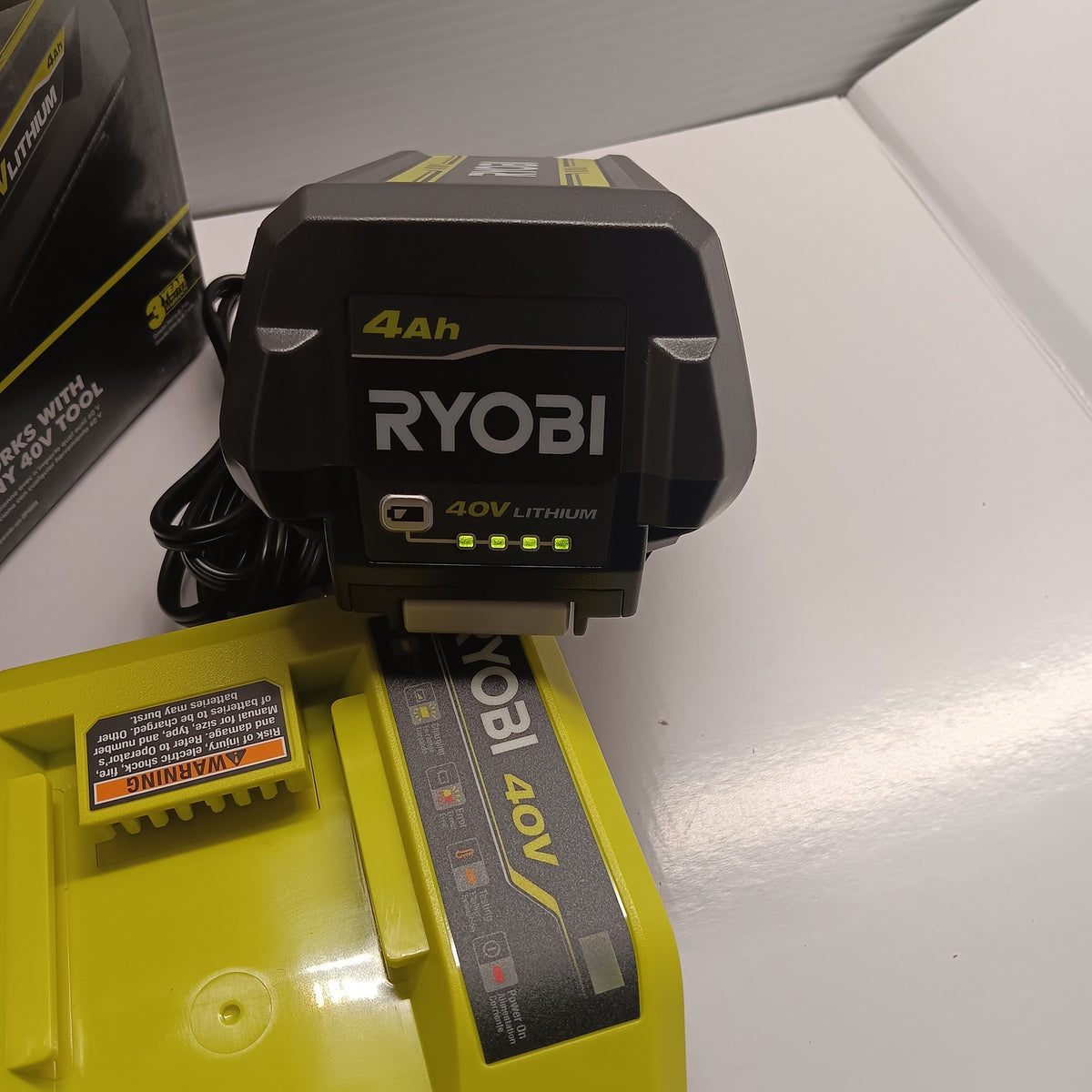 Ryobi 40V 4Ah Lithium Starter Kit Battery & Charger OP40404VNM Green