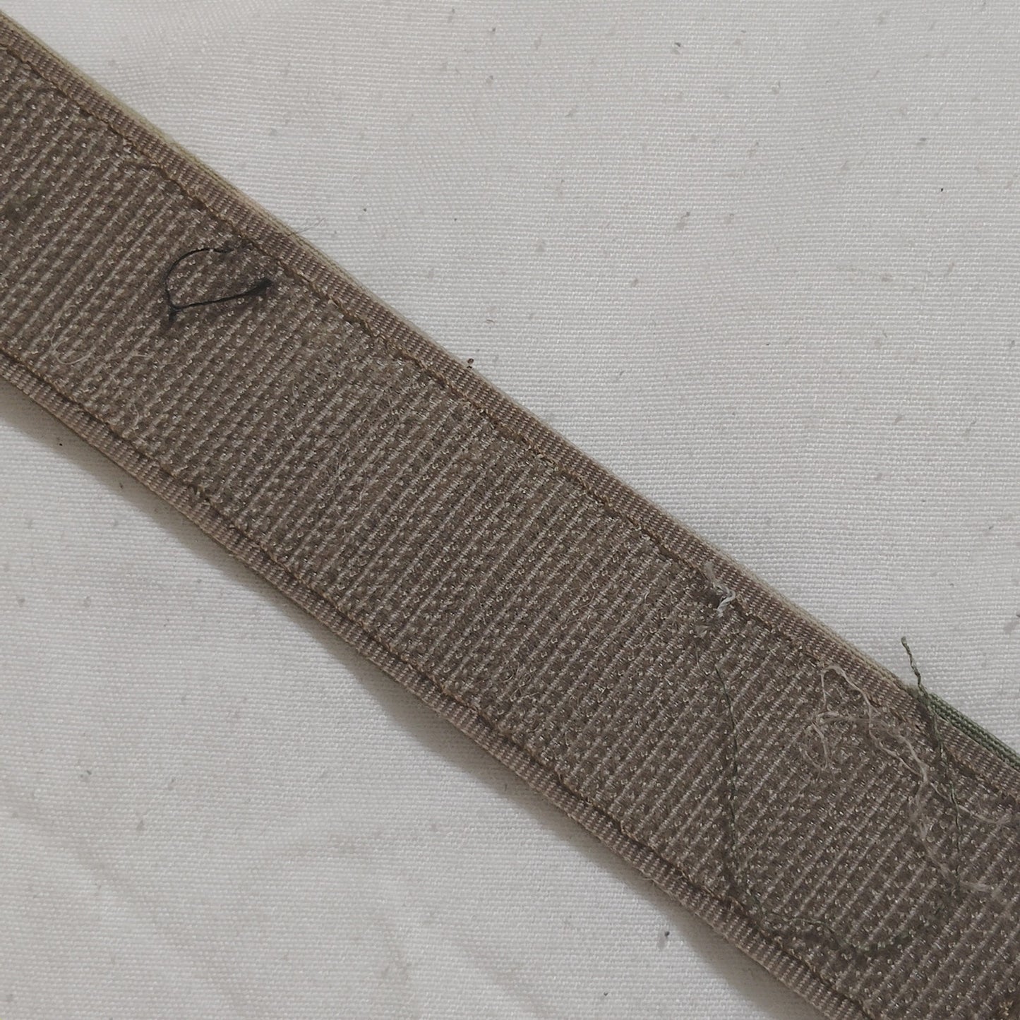Name Tape “RIOS” – Desert Tan / Khaki – Hook Back – 5" × 1" – Novelty Patch