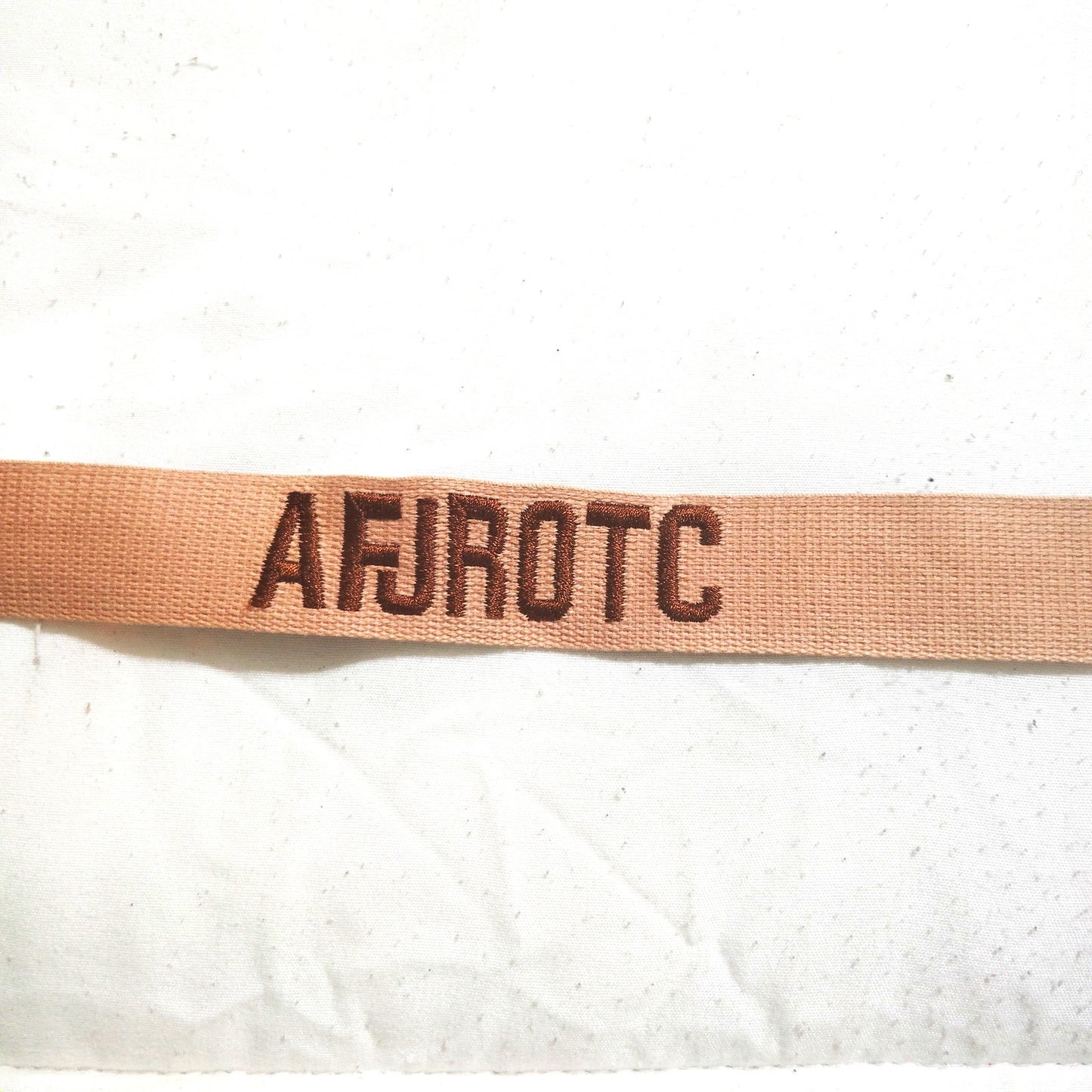 AFJROTC Branch Tape Desert Tan, Dark Brown Text 7.6" × 1" TE Sew‑On Novelty Tape