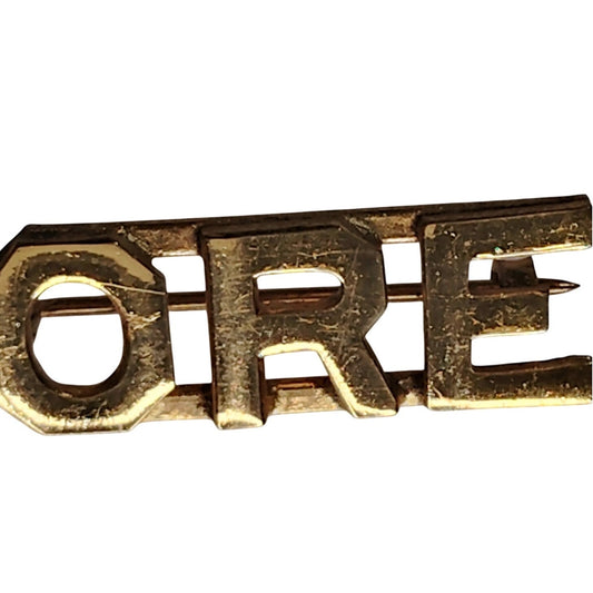 Vintage "ORE" Lettering Army Navy Surplus Hat or Lapel Pin 1‑1/8" × 3/8"