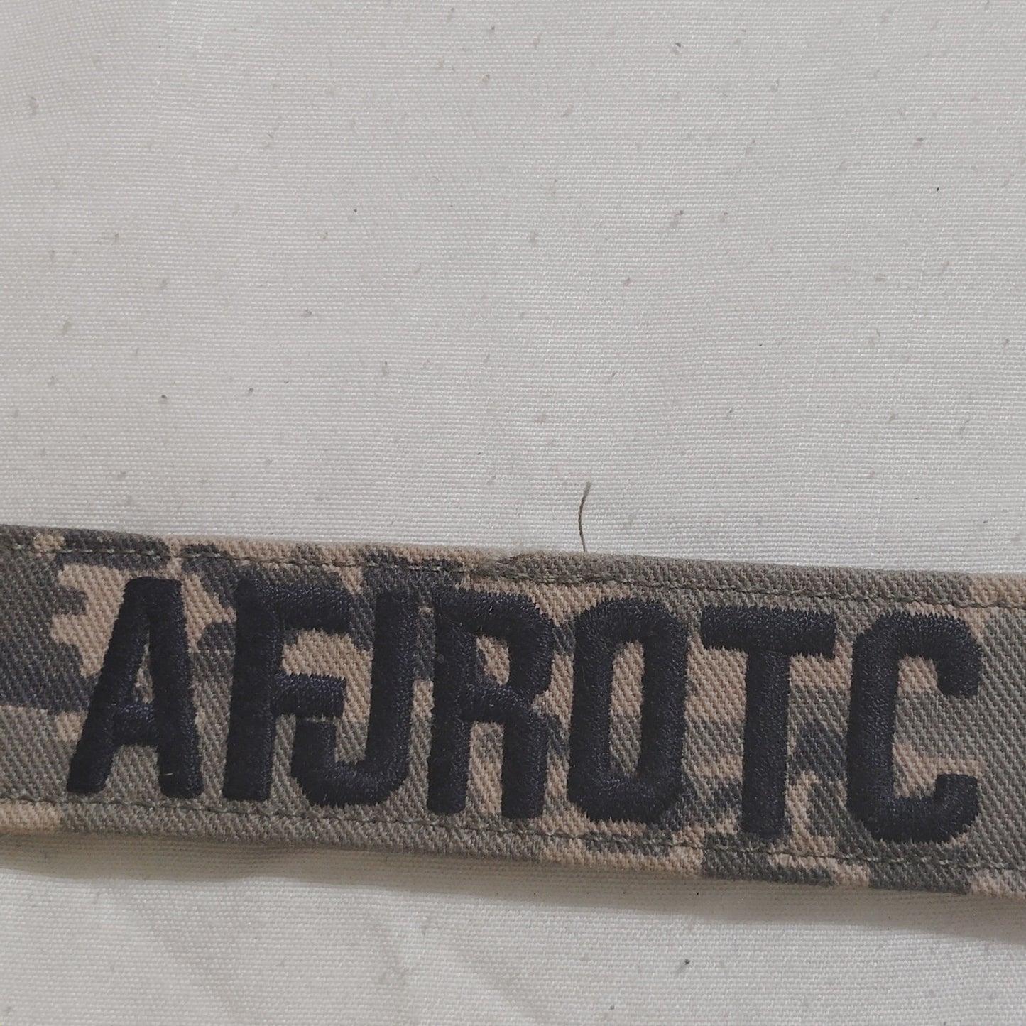 Name Tape “AFJROTC” – OCP MultiCam – Hook Back – 5" × 1" – Novelty Patch