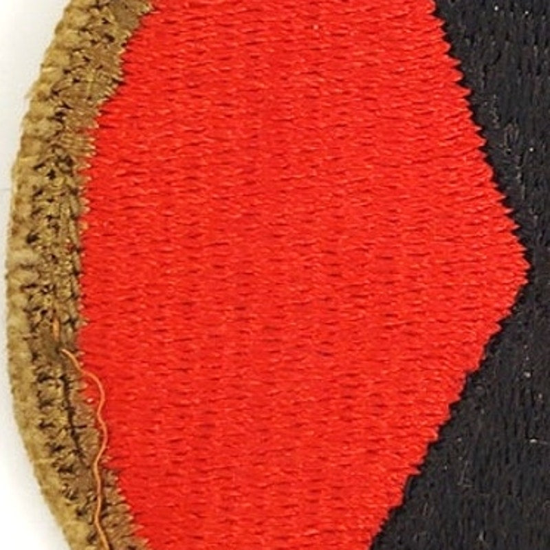 US Army 7th Infantry Division WWII Hourglass Patch – Vintage Cut Edge 2‑1/2"