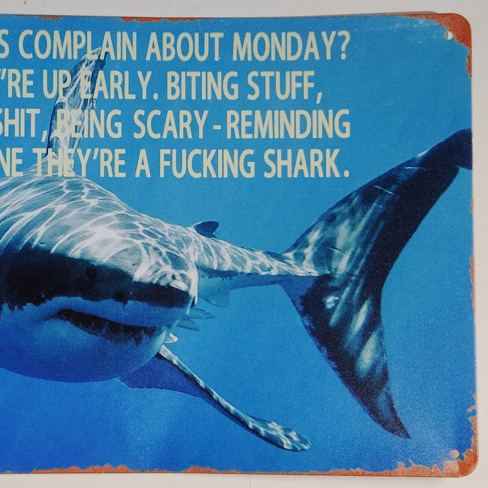 12x8 Tin Sign – “Do Sharks Complain About Monday?” – Ocean Shark Motivational Plaque – Blue & White
