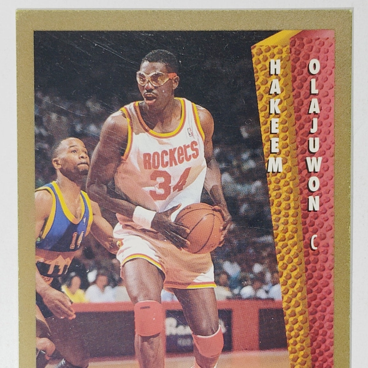 1992–93 Fleer Hakeem Olajuwon #84 Hall of Fame – Houston Rockets, Center – VG/EX