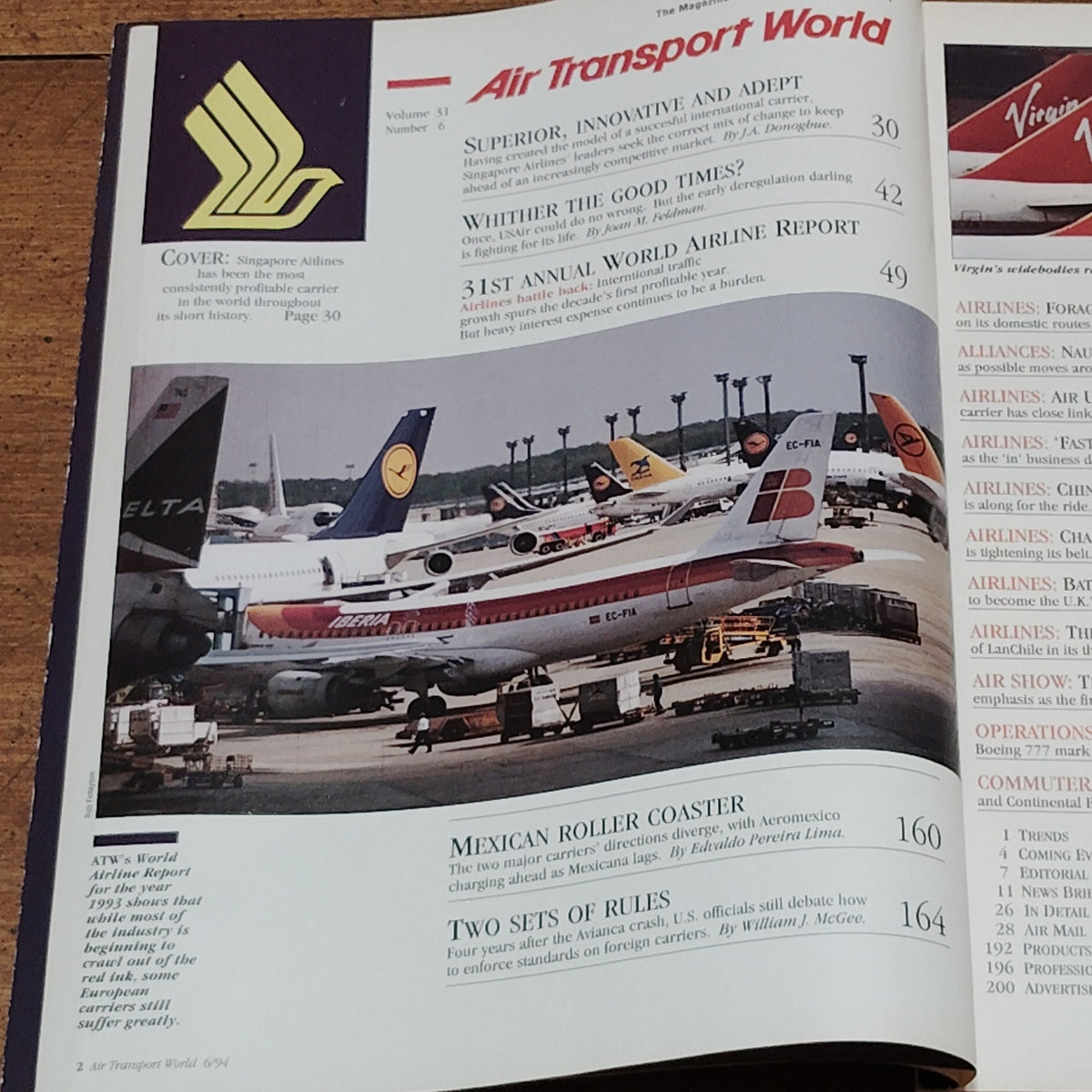 Air Transport World Magazine - June 1994 - Singapore Airlines World Airline Report