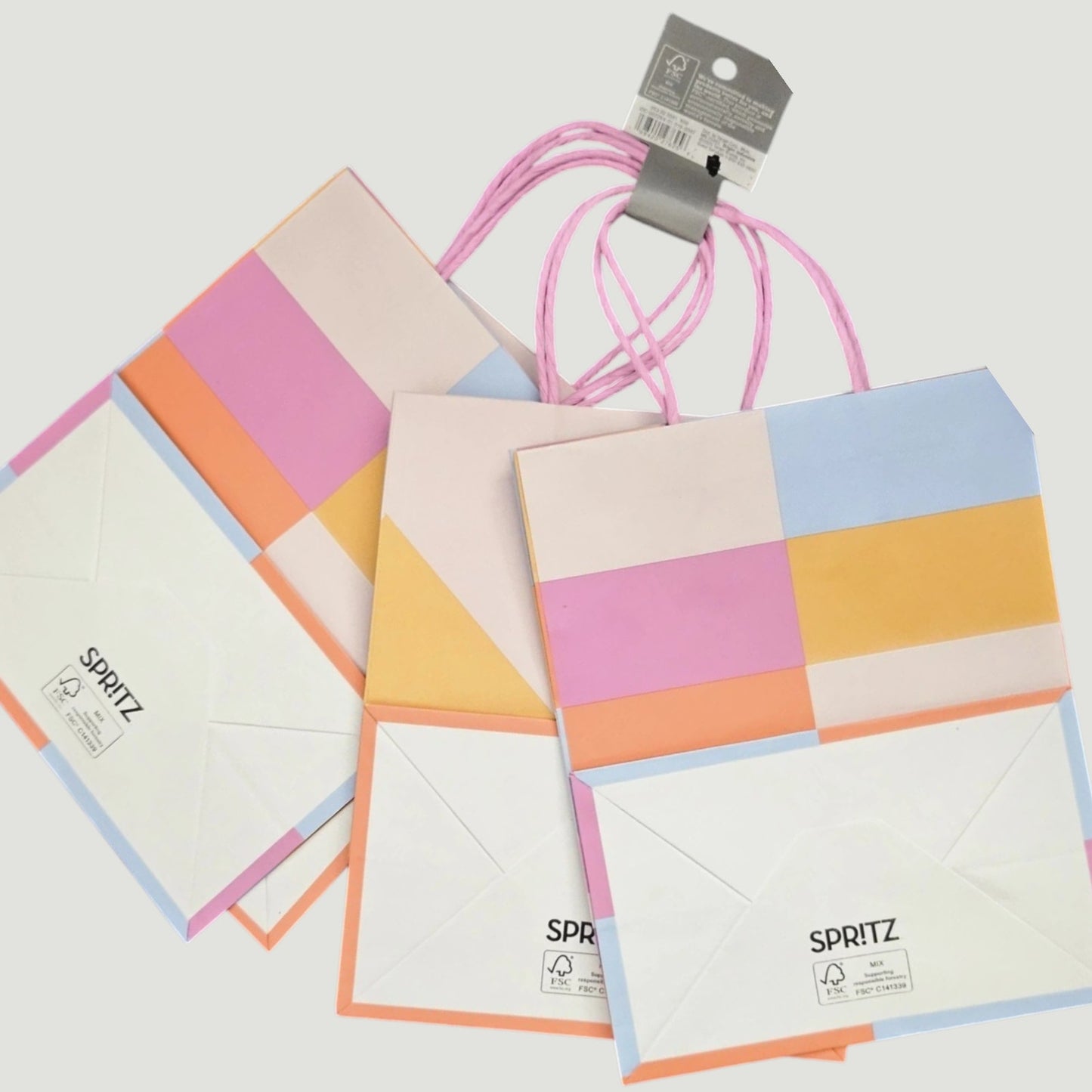 8‑Pack Geo Pastel Gift Bags – 4 Patterns – 9.625" x 7.75" x 4.625"