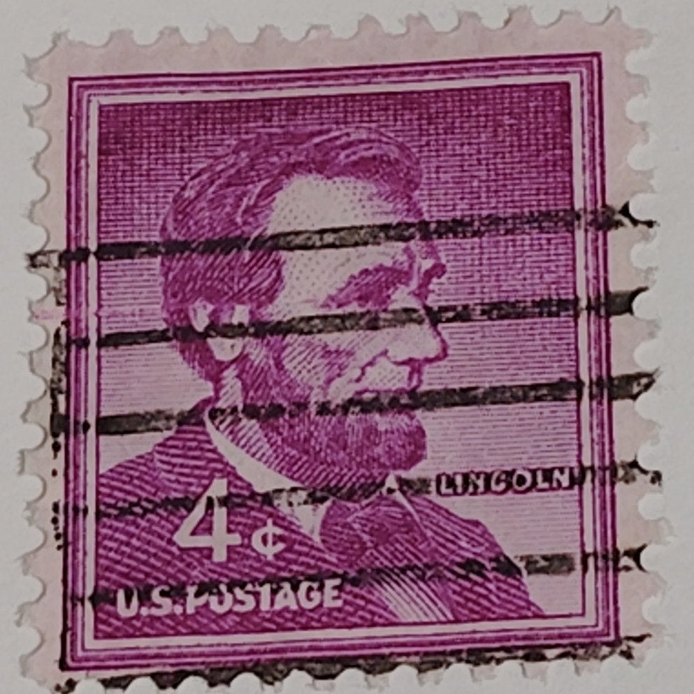 1954 4¢ Abraham Lincoln Stamp – Liberty Series – Scott #1036 – Magenta, Canceled