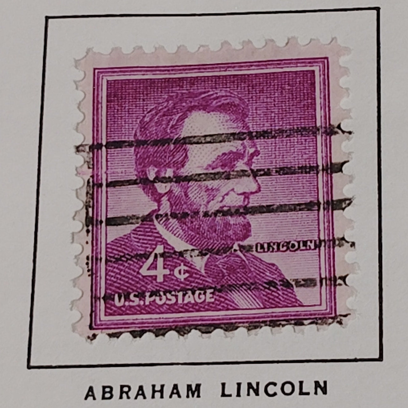 1954 4¢ Abraham Lincoln Stamp – Liberty Series – Scott #1036 – Magenta, Canceled