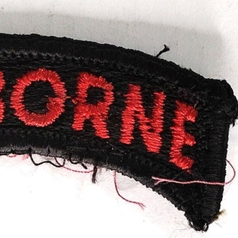 US Army Special Operations Airborne Tab Patch Red on Black 2‑1/2" × 1" Sew‑On