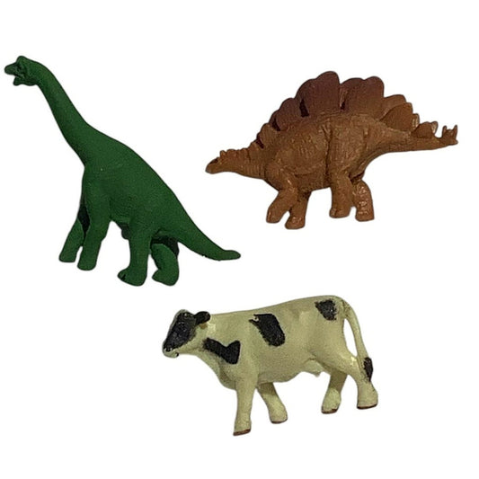 Vintage assortment of mini rubber 1" figures, lot of 3, 2 dinosaurs and 1 Cow