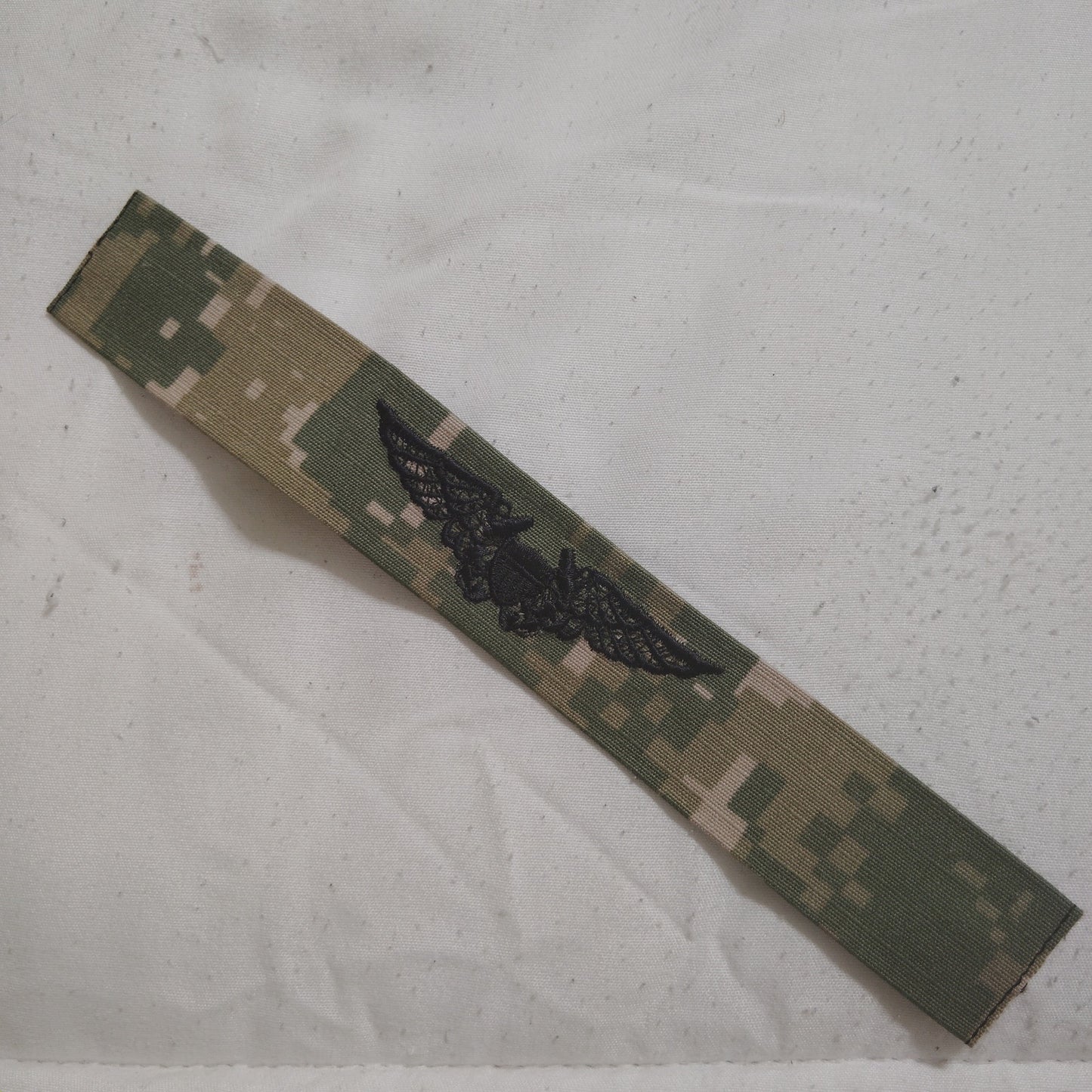 U.S. Navy Embroidered Warfare Badge Tape – NWU Type III 7.5" × 1" TE Sew-On Tape