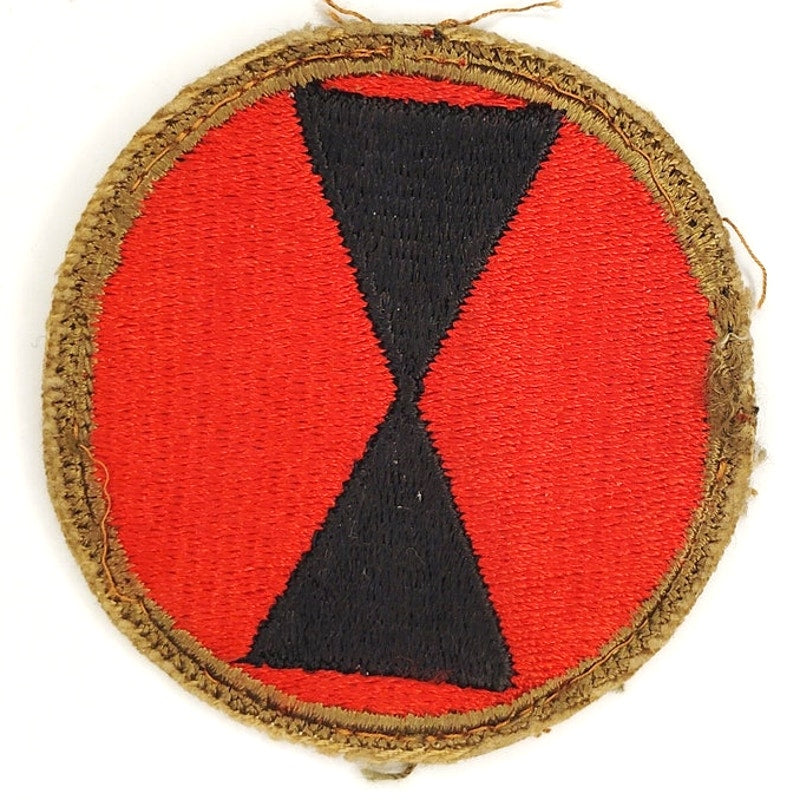 US Army 7th Infantry Division WWII Hourglass Patch – Vintage Cut Edge 2‑1/2"