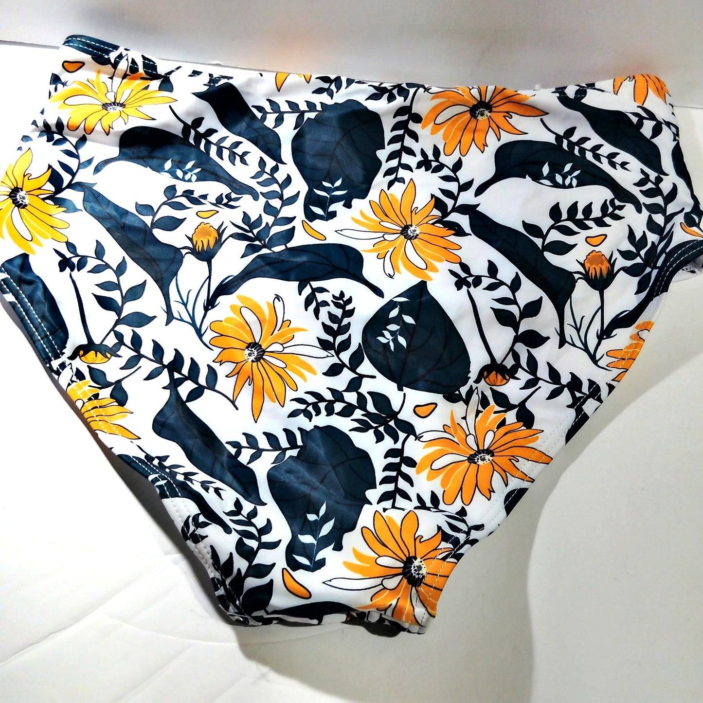 Yonique High‑Waisted Floral Bikini Bottoms – Tummy Control – White/Yellow – Med.