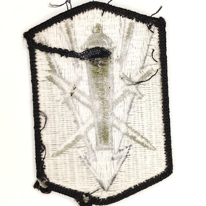 US Army 214th Fires Brigade SSI Patch Black on Bagby Green Sew‑On 3" × 2"