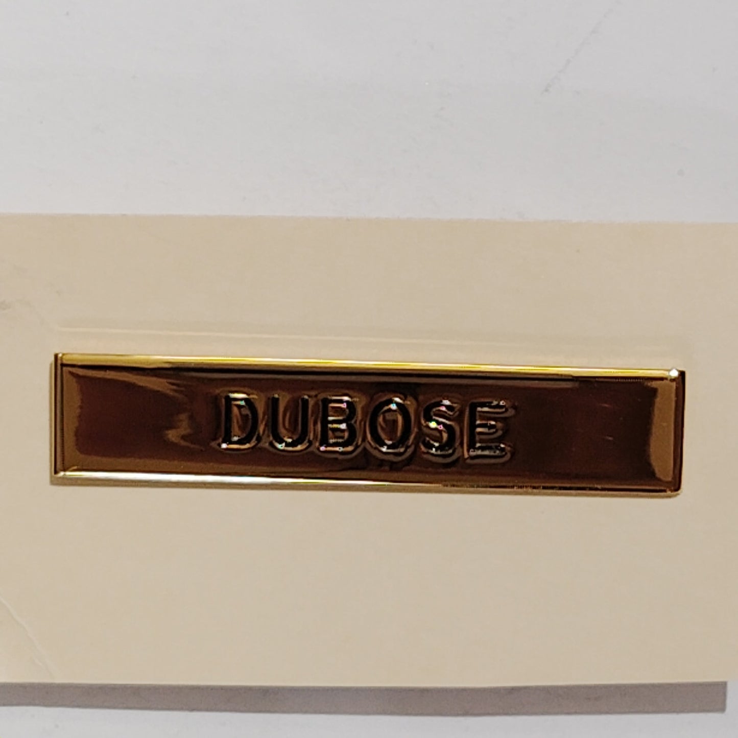Name Tag “DUBOSE”  2.5" x 0.5"  Brass Finish, Engraved Black Lettering.
