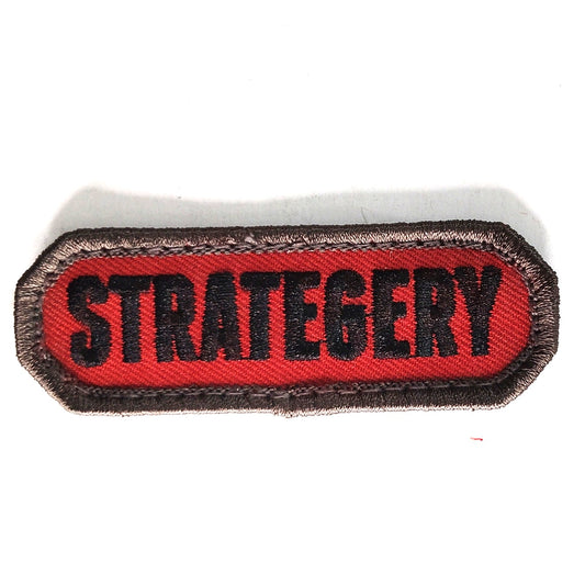 STRATEGERY Morale Patch Novelty Embroidered Black on Red 3" × 1‑1/8" Hook Back