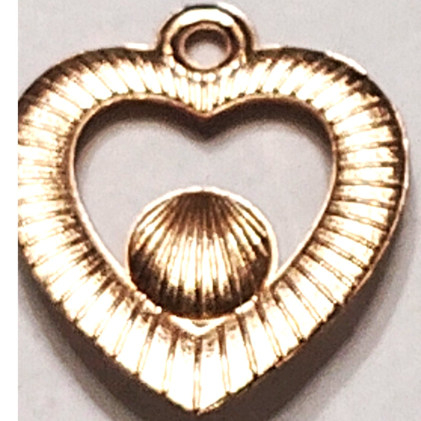Gold‑Tone Heart Pendant with Central Rhinestone and Accent Stones Jewelry Charm