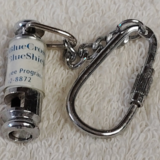 VTG BlueCross BlueShield Safety Whistle Chrome Cutout Cylinder w/ Clip Keychain