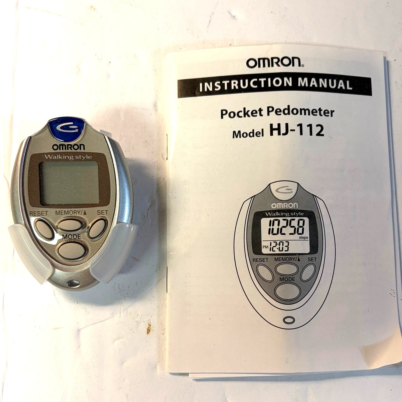 Omron HJ-112 Pocket Pedometer - Digital Walking Style Step Counter with Manual