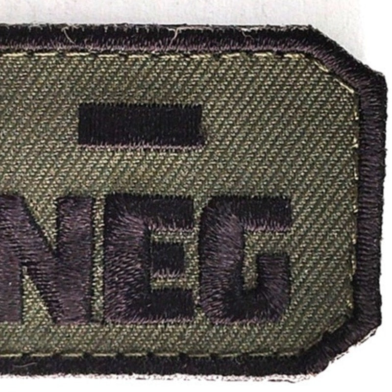 A‑ NEG Blood Type Novelty Patch Subdued Black on Green 2‑1/2" × 1‑1/4" Hook Back