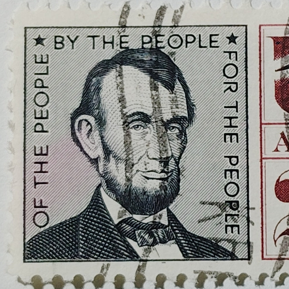 1960 U.S. Airmail 25¢ Abraham Lincoln Stamp – Scott C59 – “Of the People” – Used