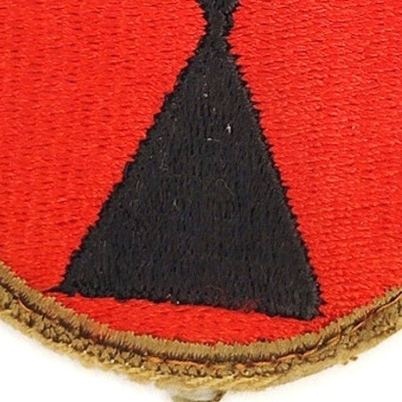 US Army 7th Infantry Division WWII Hourglass Patch – Vintage Cut Edge 2‑1/2"
