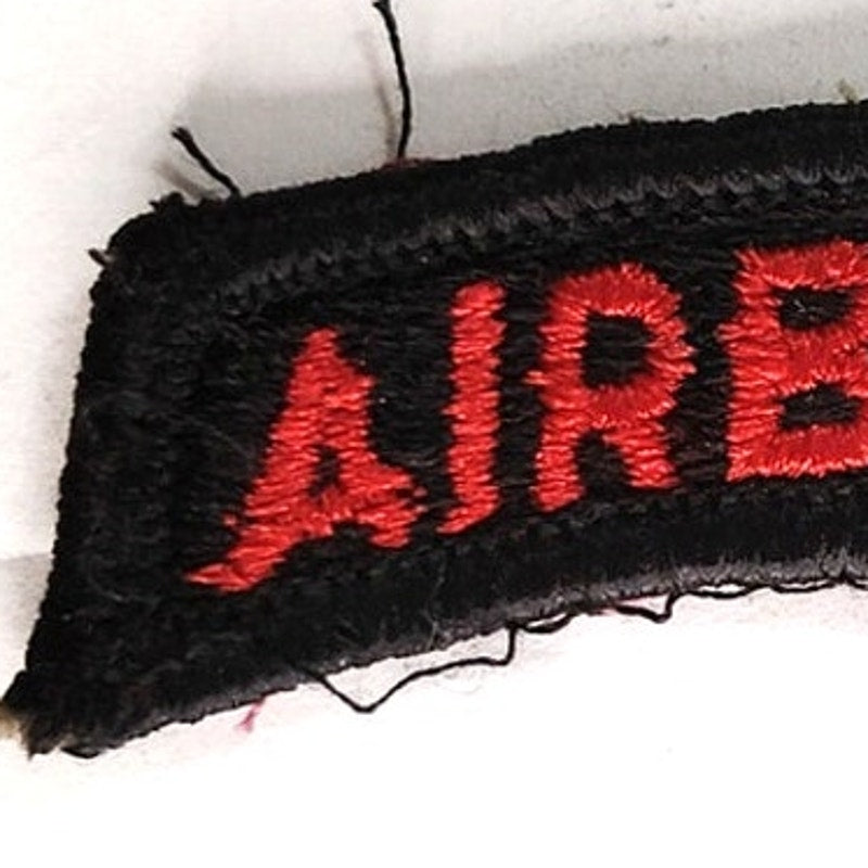 US Army Special Operations Airborne Tab Patch Red on Black 2‑1/2" × 1" Sew‑On