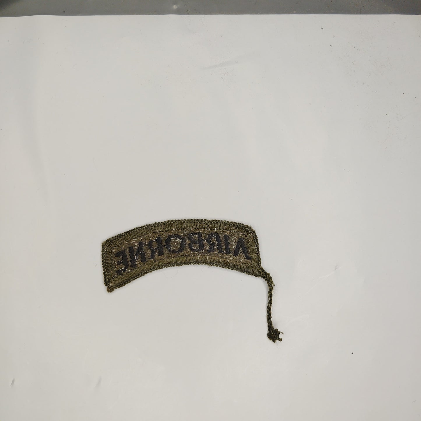US Army Airborne Tab Subdued Dark Green Black Text Sew‑On 2‑3/8"