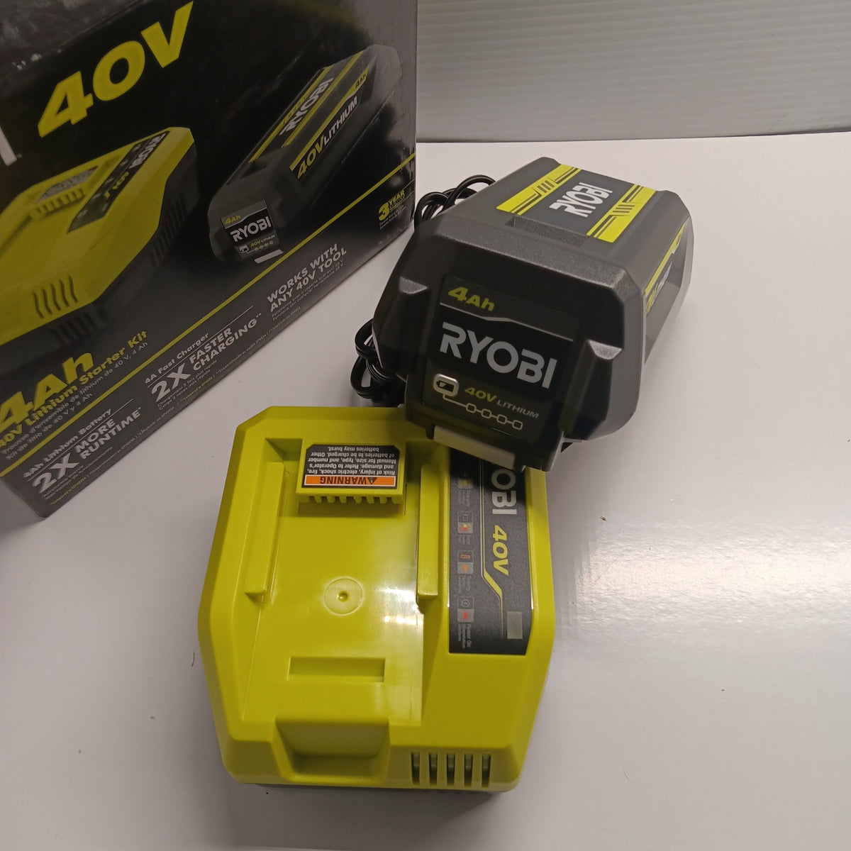Ryobi 40V 4Ah Lithium Starter Kit Battery & Charger OP40404VNM Green