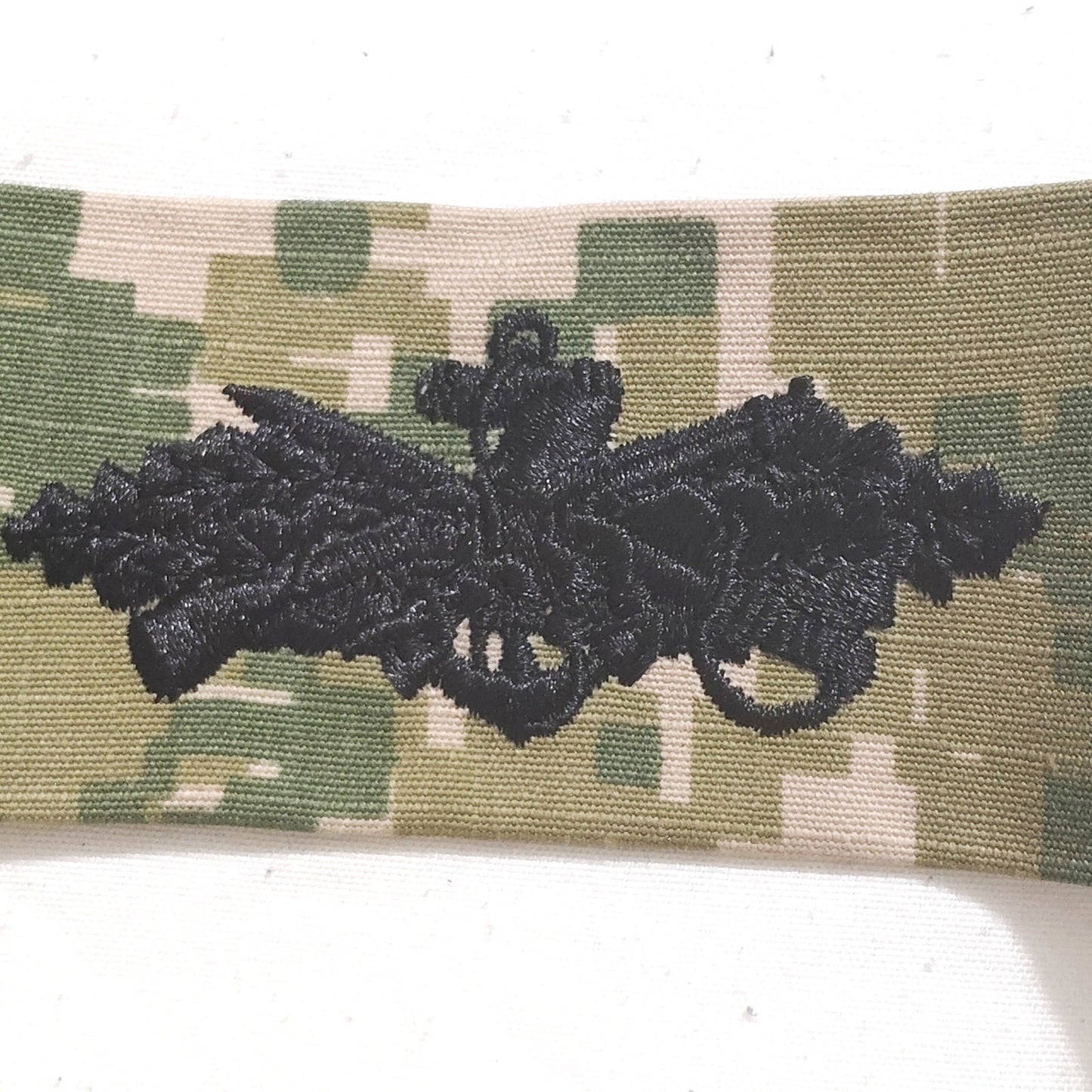 U.S. Navy Seabee Combat Warfare Patch – NWU Type III – 7.5" × 1.75" Sew‑On Tape