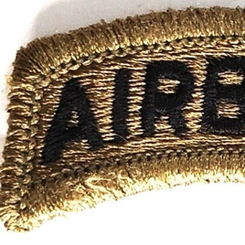 US Army Airborne Tab Novelty Patch Subdued Black on Green 2‑1/2" × 1" Hook Back